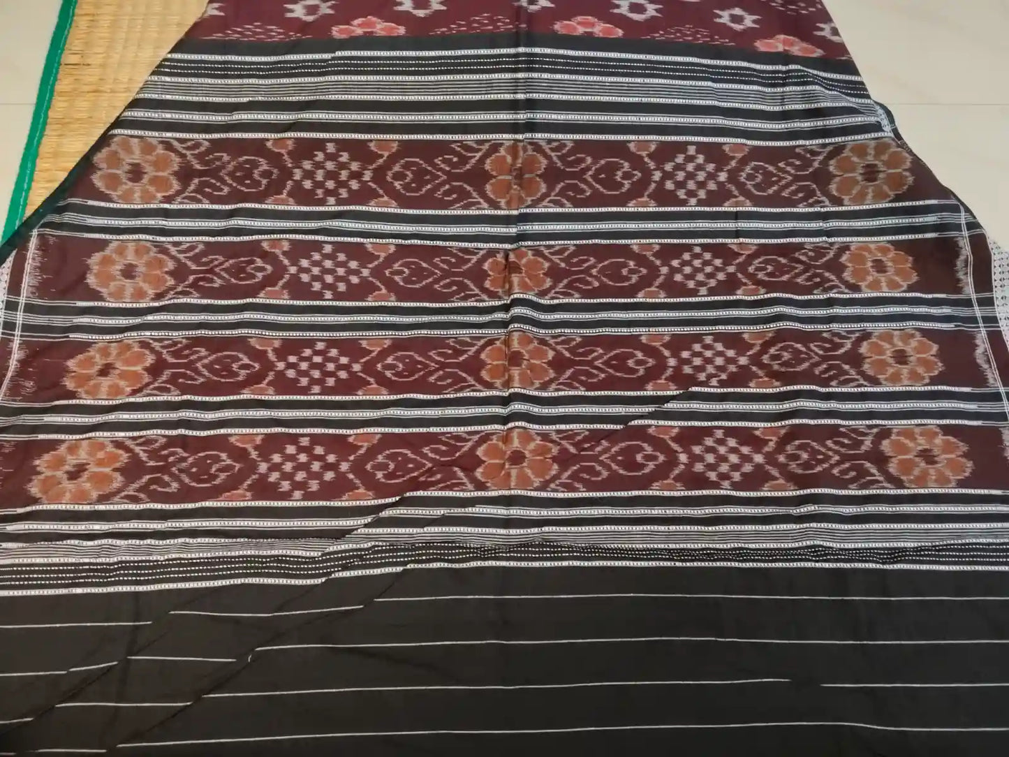 Pallu of Brown Handwoven Ikat Cotton Saree