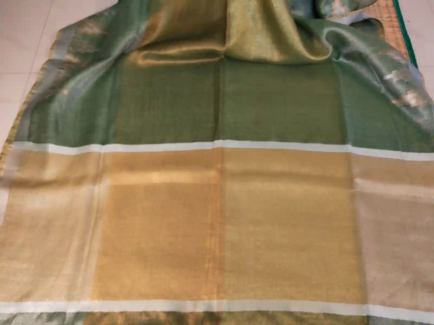 Pallu of Metallic Green Zari Linen Saree