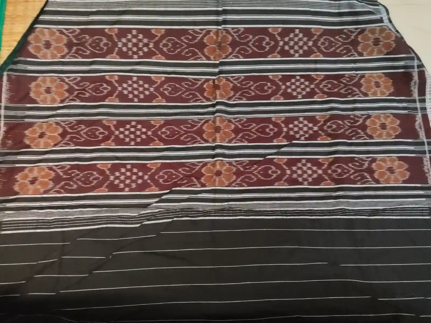 Pallu of Brown Handwoven Ikat Cotton Saree