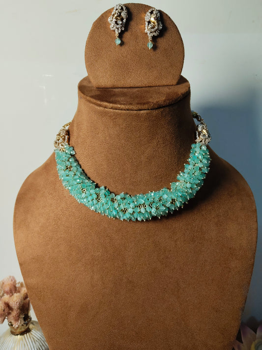 Sea Green Cubic Zirconia Cluster Lord Ganesha Matte Finish Necklace Set