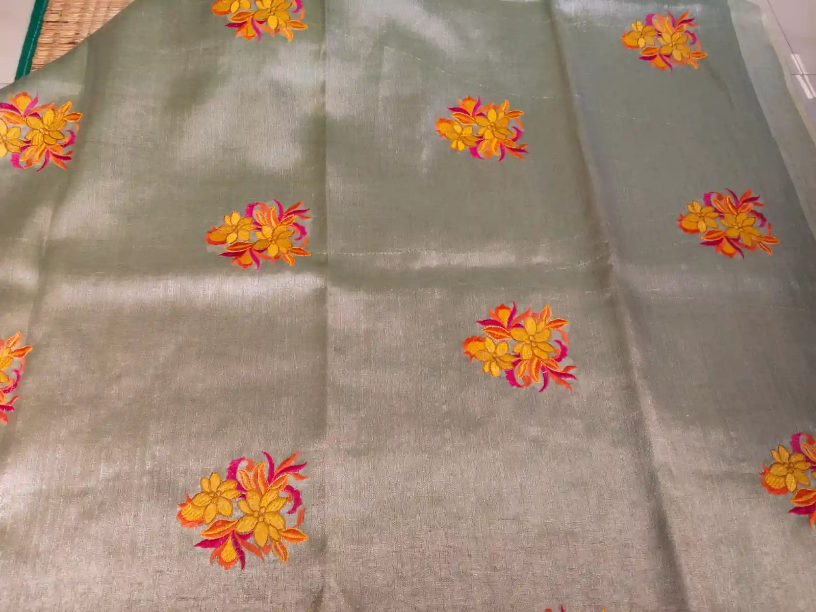 Pastel Green Embroidered Zari Linen Saree